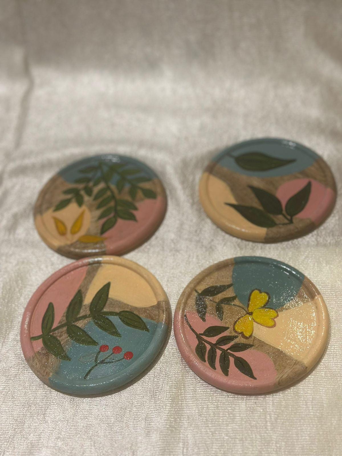 Pinkbloom Handpainted wooden coaster set of 4